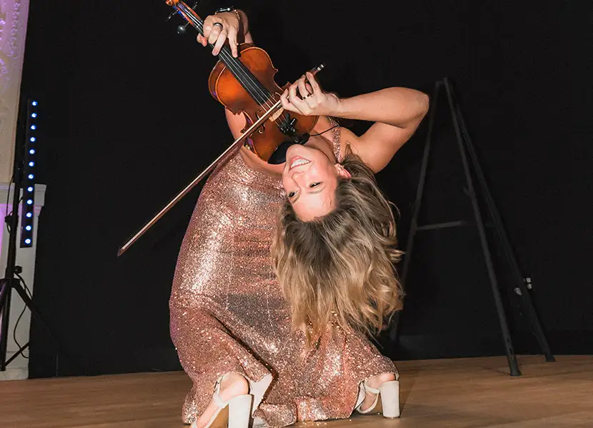 Violinist does back bend while playing