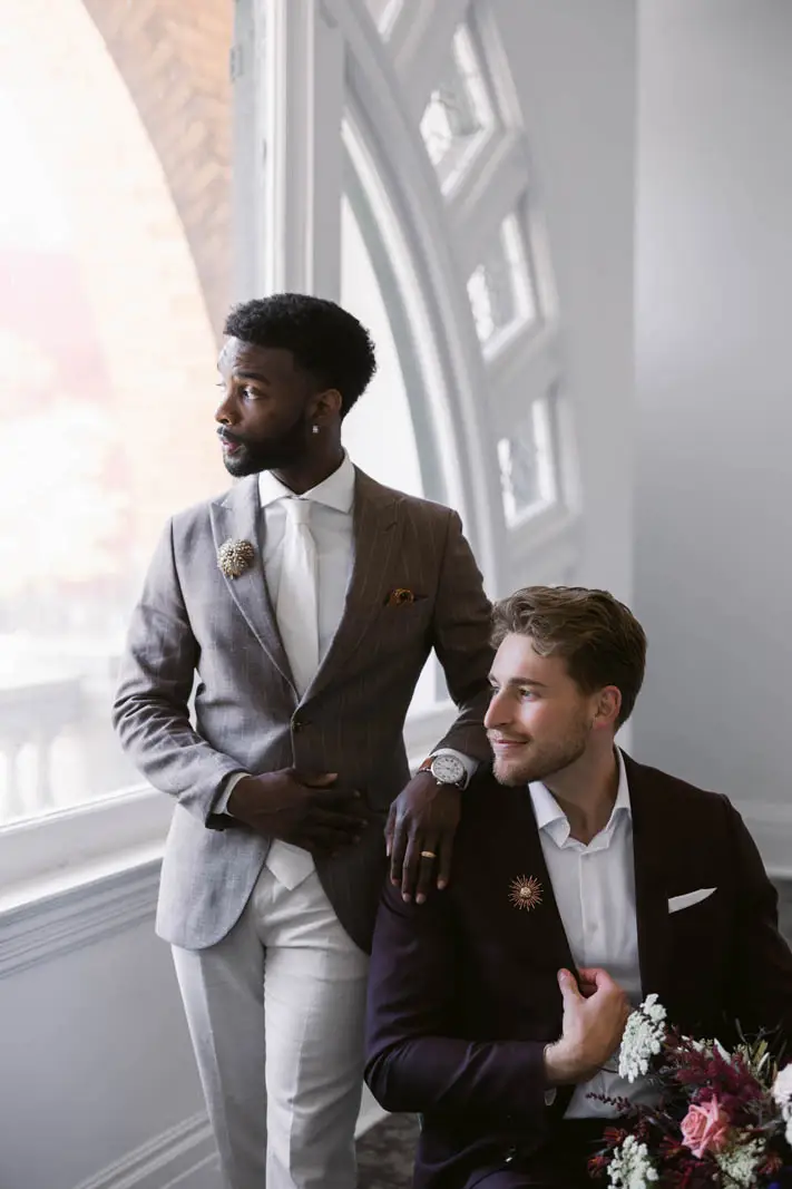 two men looking out the window